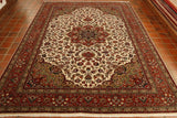 Magnificent quality Persian Tabriz carpet. Very finely knotted wool woven on to a cotton foundation with silk highlights. The carpet has a cream background which is covered in flowers and leaves. There is a large central medallion in rust and dark blue. The background colour to the main border is a rust with a range of other colours used in the design.