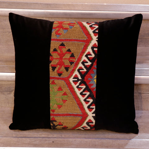 A handmade old Turkish kilim cushion with contrast panels of