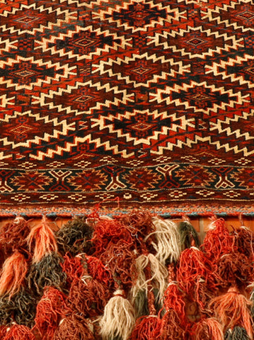 This tent hanging makes a lovely wall hanging with long tasseled fringes and fine stitch-work 