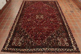 A hand knotted tribal rug from southern Iran made from wool.