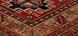 Although this hand made rug looks quite modern with its geometric pattern, it is a very traditional design originating from the Caucasus.