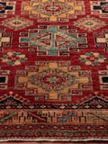 Unusual square shape with repeating geometric medallions.