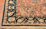 An interesting design has been used incorporating birds and animals including some winged mythical creatures. The whole rug is framed by a deep blue border containing more vases and pots that have come from an archeological dig. The rug is finely woven using wool on to a cotton foundation and parts of the pattern are made using silk.