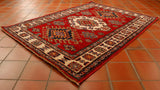 Bold Caucasian design in vibrant colourings of red, blue and cream