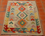 mainly pastel colours which include gold, tangerine, heather and some accent colours of strong sea green and flame red.