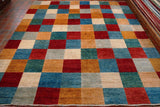 design made up of plain squares in terracotta, cream, old gold, blue, brick red and dark green.