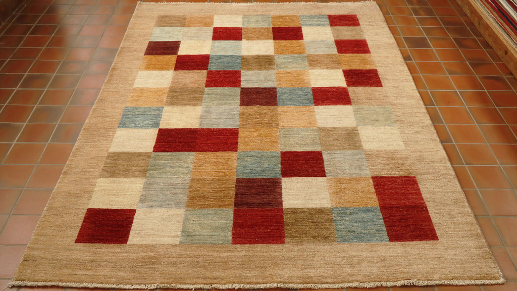 Cream oatmeal border with blocks of colour using red, cream, sea green, sea blue, burgundy and golden yellow in a chequerboard pattern. 