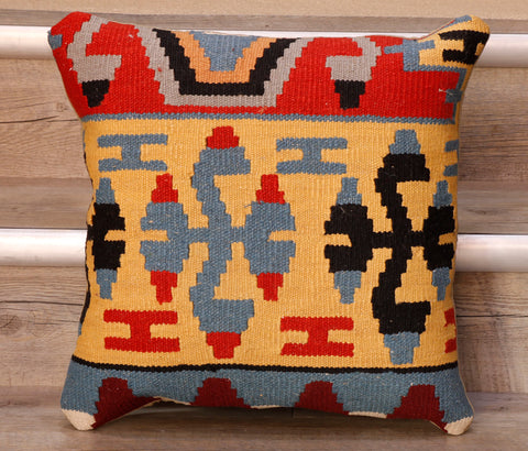 The pieces are often salvaged from old Turkish kilim so the pattern may be cut in unusual and interesting ways.  The decoration is made up of geometric shapes. The brightly coloured Kilim has touches of vibrant reds, blues, yellows, blacks and burgundy which contrast against the other colours on the facing side, whereas the back of the cushion is Faux suede or cotton.