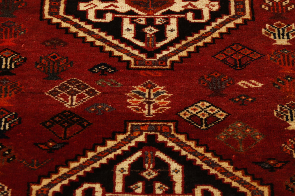 These rich tribal Persian Qashqai rugs have a traditional rustic feel